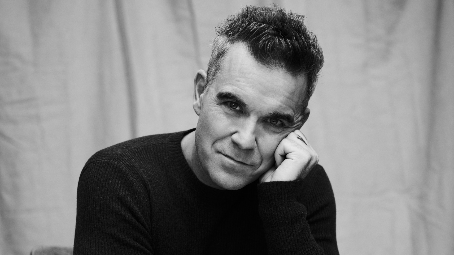 De volta ao país após 20 anos, Robbie Williams quer